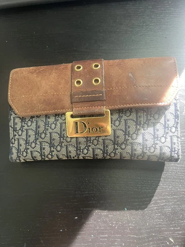 Authentique portefeuille trotteur en cuir Dior
