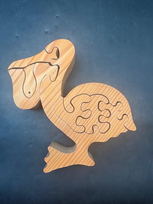 Vintage Wood Cut Puzzle of a Pelican Bird