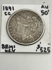 KEY AU 181-CC MORGAN DOLLAR.  Light even wear and NEVER CLEANED. Trends $525+