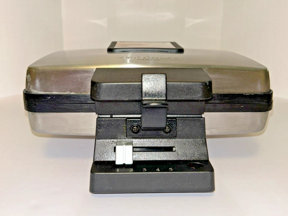 Prensa de oblea para galletas Cuisinart Perfect Pizzelle acero inoxidable WM-PZ2 120v usada Foto 3 de 4