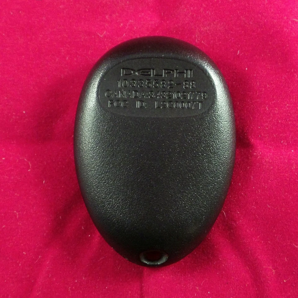 Mando a distancia de entrada sin llave GM 2001-2007 OEM 4B trasero - L2C0007T Foto 2 de 2