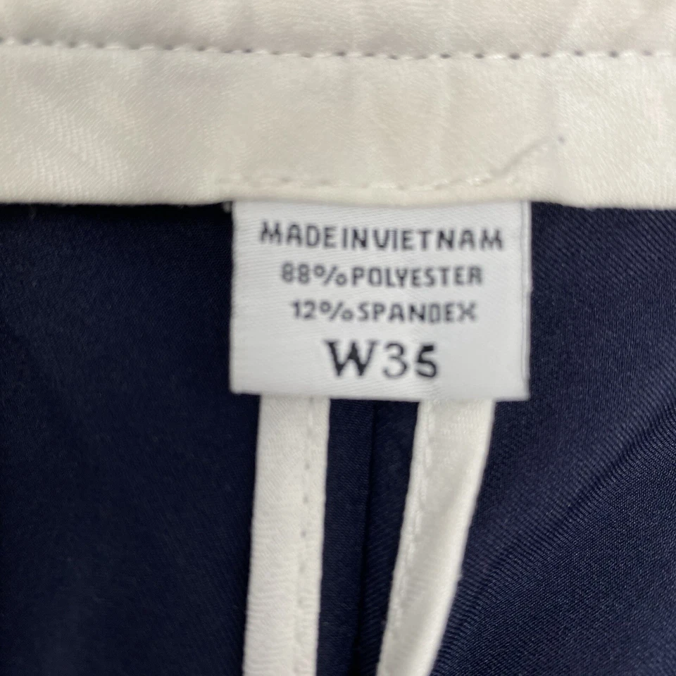 Pantalones Cortos Chinos de Golf FootJoy Para Hombre 36 Azul Marino Elastizados Ligeros Frente Plano Foto 4 de 4