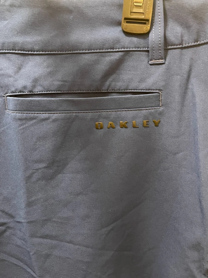 Pantalones Cortos Híbridos Oakley Para Hombre Frente Plano 5 Bolsillos Azul Oscuro 442533 Talla 34 S315 Foto 4 de 4