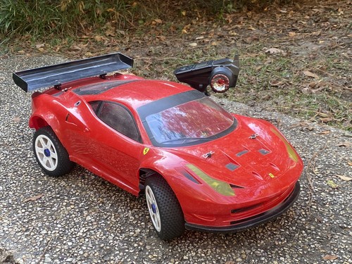 Kyosho 4WD Ferrari 1/8 Nitro Radio Controlled Car with Radio (engine Needs Work - Picture 2 of 15