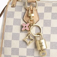 Authentic Louis Vuitton Lock  Key with Unbranded Flower Charm, Keychain