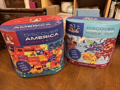 2 Crocodile Creek puzzles- AMERICA & WORLD CITIES-100 pc 22  X 28  w/figures