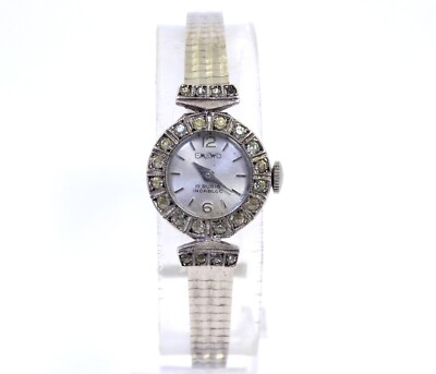 Vintage Ladies EMEWO 17 Jewel RUBIS INCABLOC Winding Watch w/ Halo Bezel