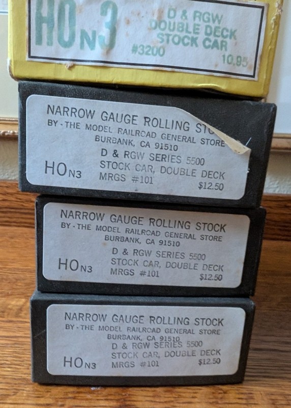 Four HOn3 E&B Valley D&RGW Double-deck Stock Car Kits. 