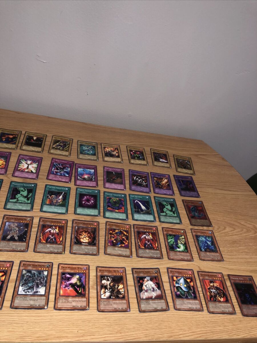 Yu-Gi-Oh Trading cards (56 Total) Produced In 1996. Random Yu-Gi-Oh Trading cards (56 Total) Produced In 1996. Random