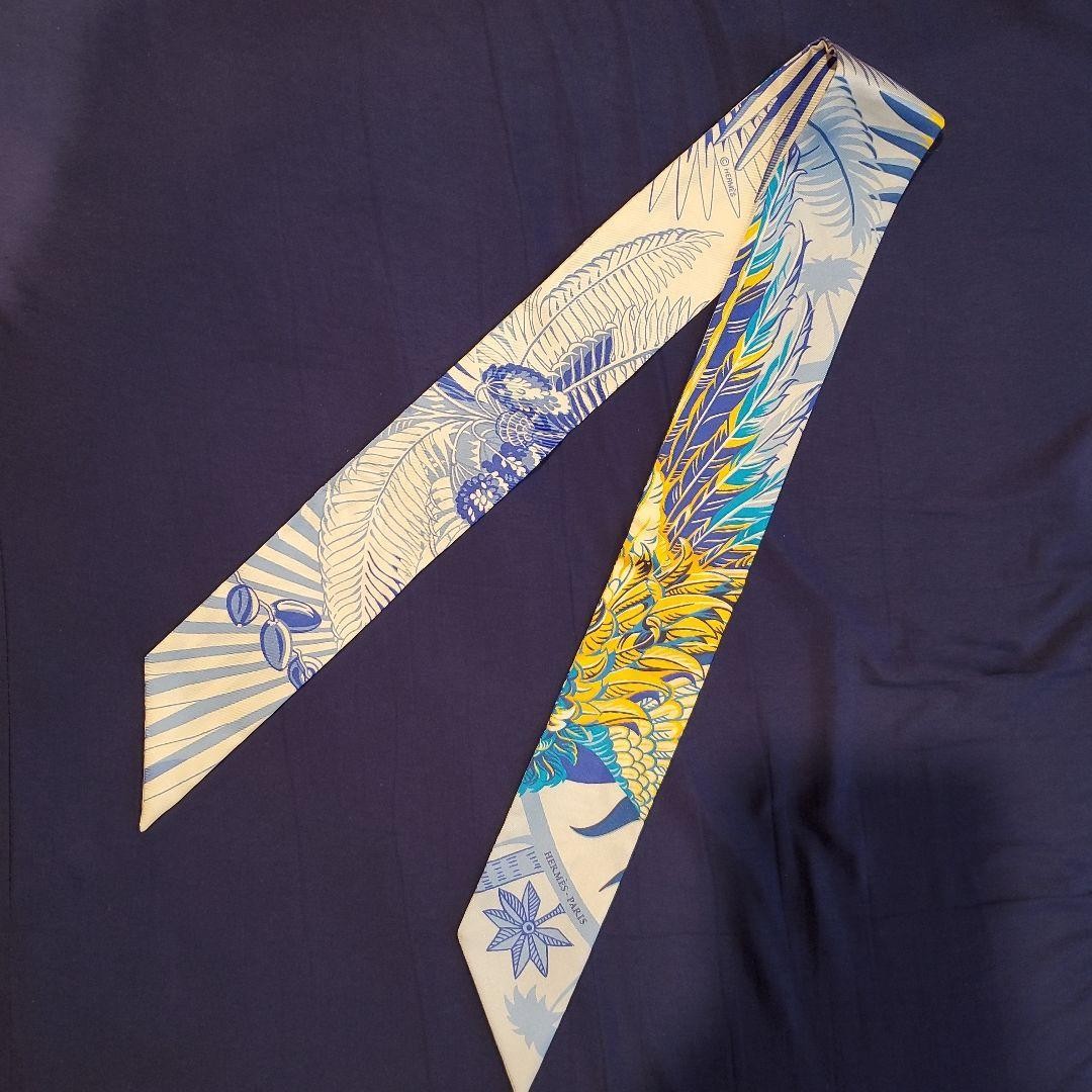 Hermes Blue Silk Twilly Scarf with Elegant Design