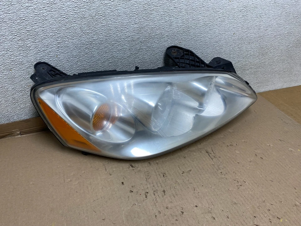 Faro halógeno lado derecho pasajero Pontiac G6 2005 a 2009 OEM U1074 DW Foto 3 de 4