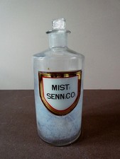 ANTIQUE LARGE CLEAR APOTHECARY / CHEMIST BOTTLE - MIST: SENN: CO: