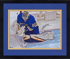 Framed Jordan Binnington St. Louis Blues Signed 16x20 Overhead Glove Save Photo
