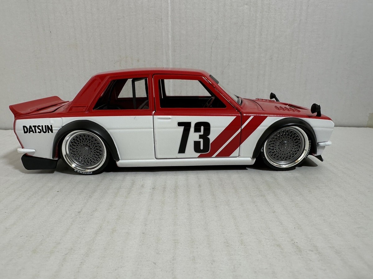 送料込み　JADATOYS 1:24 JDM TUNER 1973 Datsun Amazon.com: Jada Toys JDM Tuners 1:24 Scale Die-Cast 1973
