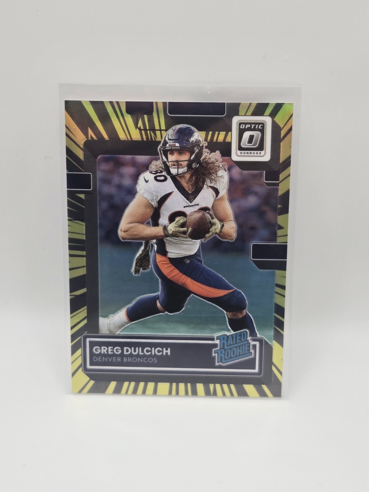 2022 Panini Donruss Optic-RR Electricity Prizm /65 #288 Greg Dulcich (RC) Bronco