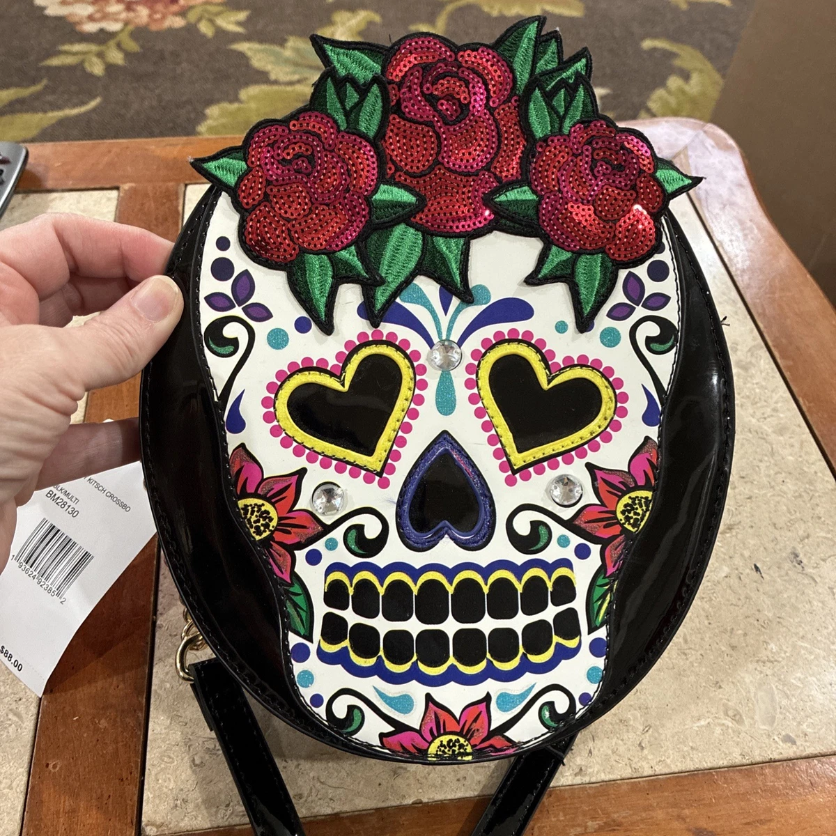 Luv Betsey Johnson Black Skull-Embossed Sling backpack XOALLIE Betsey Johnson Satchel/Top Handle Bag Skull Bags & Handbags  main image 2