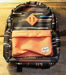 black and orange backpack