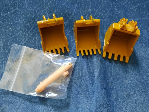 Cucchiaio CAT 336 e 323 + cilindro idraulico simile NZG