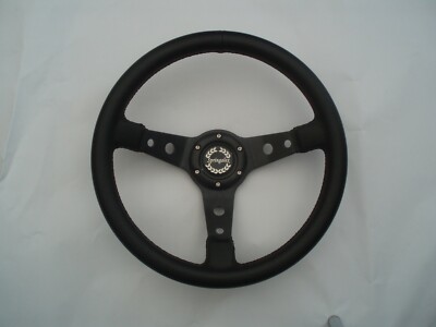 FORD ESCORT MK11 DEEP DISH LEATHER AND SPRINGALEX LOW PROFILE BOSS.      