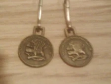 SET OF TWO NORTH AMERICAN HUNTING CLUB ZIPPER PULLS. EX
