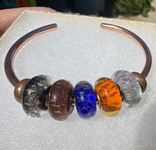 Authentic trollbeads 8 pc lot. 5 retired glas...
