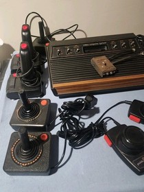 Atari 2600 System Bundle with Console, 24 Games, Joystick, Paddles, and More LOT