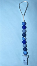 Blue silicone dummy clip.