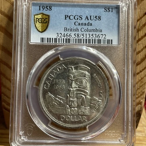 Canada 1958 Dollar Silver Coin: PCGS AU58