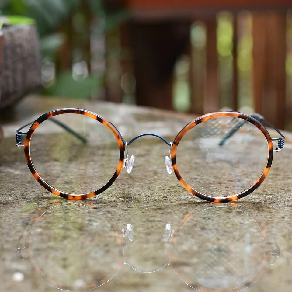 Gafas redondas para hombre Tortuga marco redondo azul aleación de titanio piernas gafas para mujer Foto 2 de 4