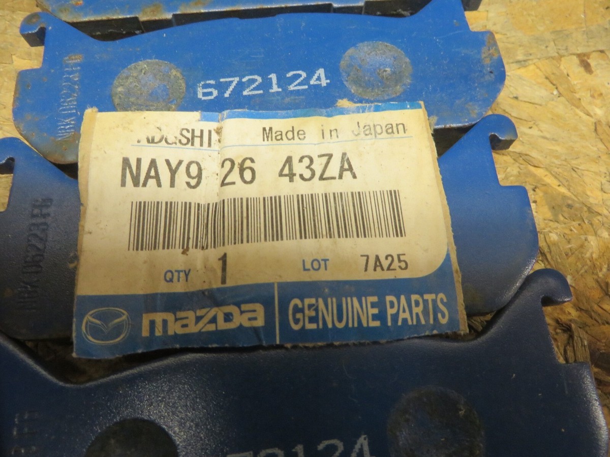MAZDA OEM # NAY9-26-43ZA OEM nos REAR DISC BRAKE PAD SET | eBay