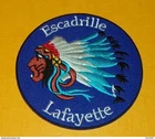 PATCH FABRIC: LAFAYETTE SQUADRON WITH BLUE BACKGROUND, DIAMETER 9 CM, GOOD CONDITION V