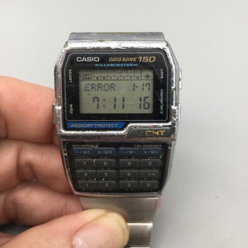 Vtg Casio Data Bank Watch Men 1477 DBC-610 Silver Tone Calculator New Battery - Picture 8 of 14