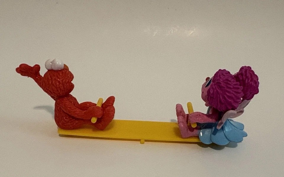 Taller de sésamo panadería artesanías Elmo Zoe Teeter Totter ver-sierra figura tapa de pastel Foto 2 de 4