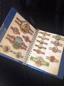 Binder with collection of cigar bands