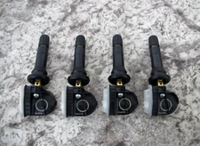 4 x New OEM Ford F2GT-1A180-AD TPMS Tire Pressure Monitoring System Sensors Set