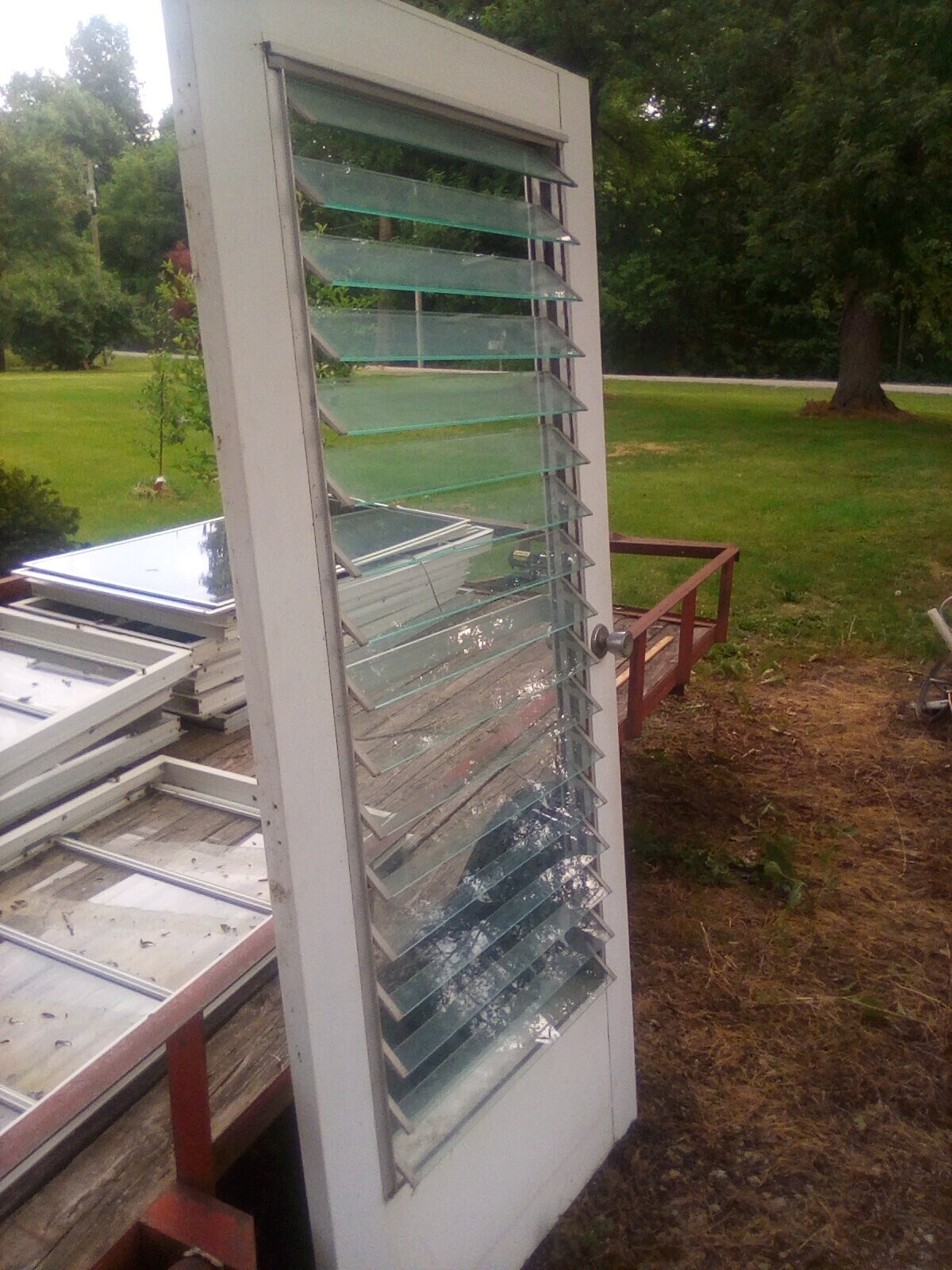 Jalousie door crank out window louvered glass 36x80 vintage with frame