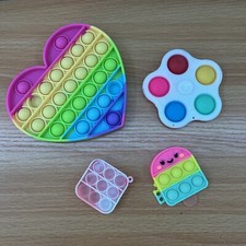 Lot of 4 Pop It Fidget Toys   Fun Stress Relief and Sensory Play for All Ages