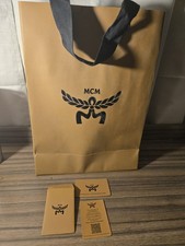 MCM Gold Paper Gift Bag with Cloth Handle Shipping Bag Black Logo