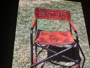leather camping chair that has been hand tooled