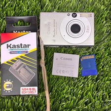 Canon PowerShot SD1000 Digital ELPH 7.1MP Camera with Battery and Charger