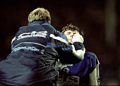 Chirs Sutton of Blackburn Rovers receives treatment FA Carling Pre- Old Photo