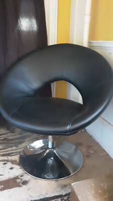 MCM Retro atomic egg black swivel and chrome lounge chairs