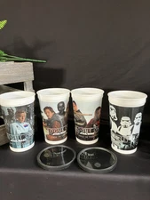 Four Star Wars Rogue one Swiss Chalet Cups 5.5” X 3.5”.  Two Black Lids Plastic