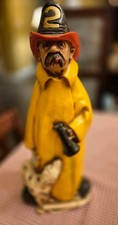 Listing image for Firefighter Statue with Dalmatian Dog, Yellow Coat, Number 2 Helmet Collectible