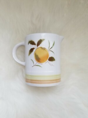 Harmony House Tangerine Creamer Dish cup, iron stone 4264, white with orange