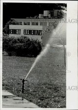 1981 Press Photo Water sprinkler at Bennett Elementary - lra24399