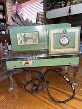 Empire toy/salesman sample,antique working stove, green/cream enamel,nickel legs