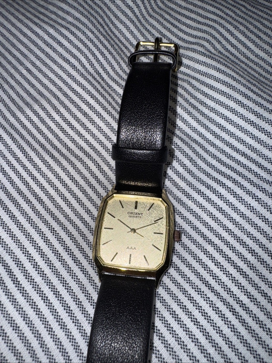 Vintage Orient AAA Quartz. Gold With Black Leather Strap | eBay