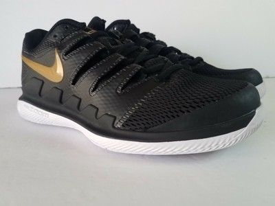 nike black and gold tennis shoes