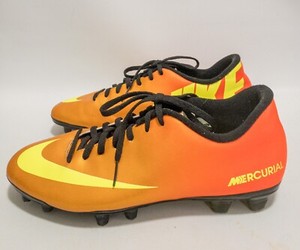 black and orange mercurial cleats